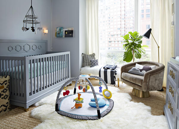 Nursery featuring several products from Fisher-Price by Jonathan Adler collection.