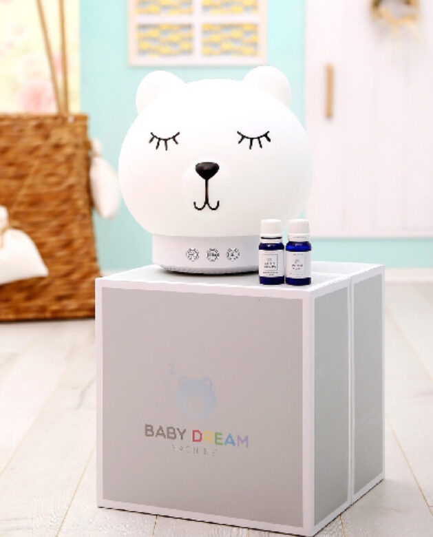 The Baby Dream Machine is a humidifier, sound machine and nightlight with red-light therapy and aromatherapy—a.k.a. a 
godsend.