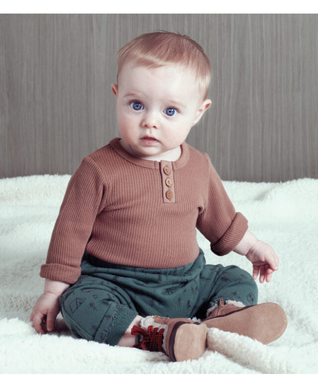 Brody wears City Mouse top, Tiny Giants joggers and Robeez crib shoes.