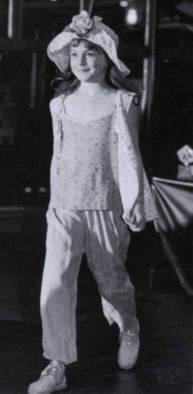Lindsay Lohan models in Earnie  fashion show.  1995, Jan. issue