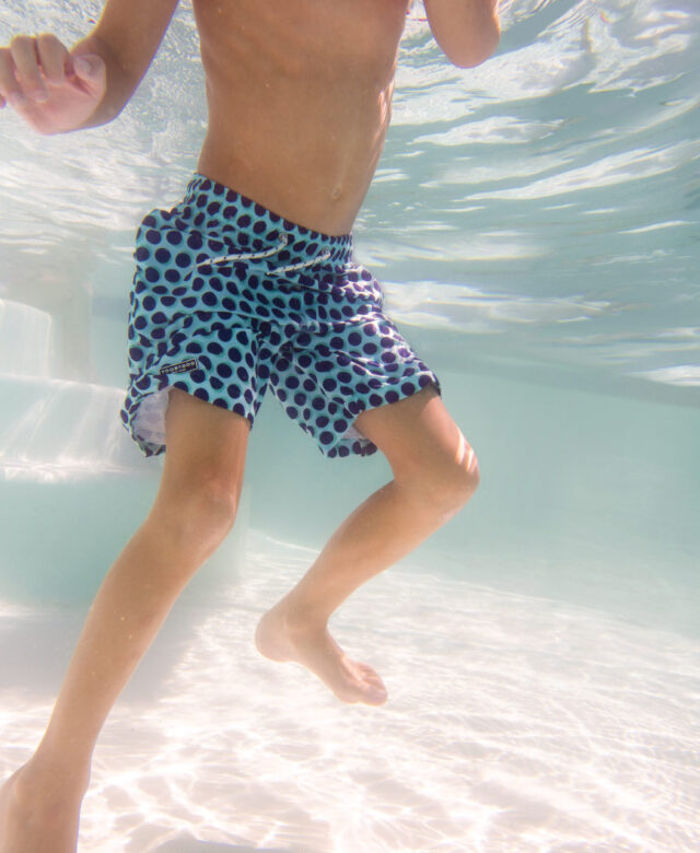 George wears Toobydoo polka 
dot trunks.