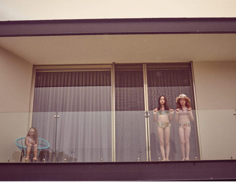 From left: Andy is wearing swimwear by Feather 4 Arrow and sunglasses from Jonas Paul Eyewear; Carlotta is wearing swimwear by Molo; Léo is wearing swimwear and hat by Olga Valentine.