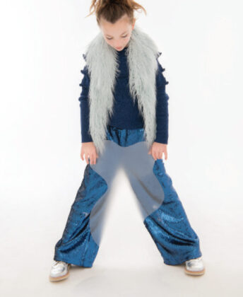 Peyton wears Widgeon light blue faux fur vest, top and sequin pants by Molo and Young Soles silver brogues.