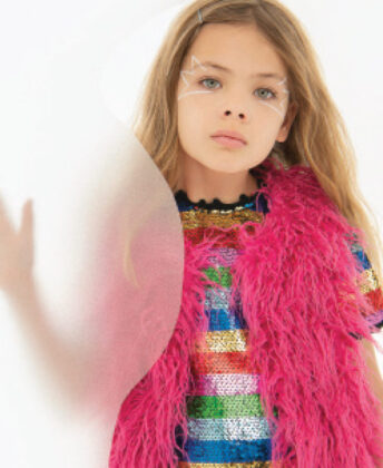 Sophia wears Hatley 
faux fur vest with 
Lola + the Boys dress.