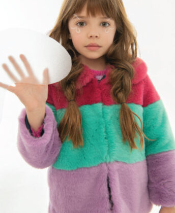 Layla wears Hatley colorblock faux fur coat.