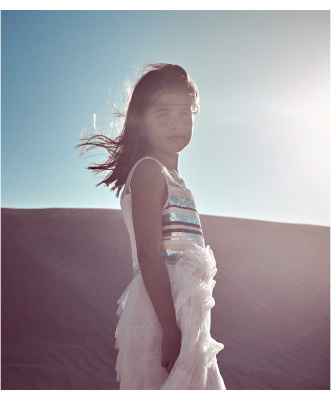Sophia wears BCBGirls dress, Dan De Fran shoes and Fun Socks socks.  

Styling by Mariah Walker/Art Department, NYC: styling assistance by Khalila White.