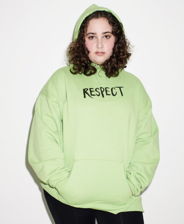 Violet wears Hanes (customized) sweatshirt.