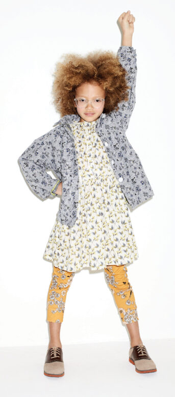 Sydney wears Omibia dress, Munster Kids pants and Yellowpelota jacket and Florsheim shoes.