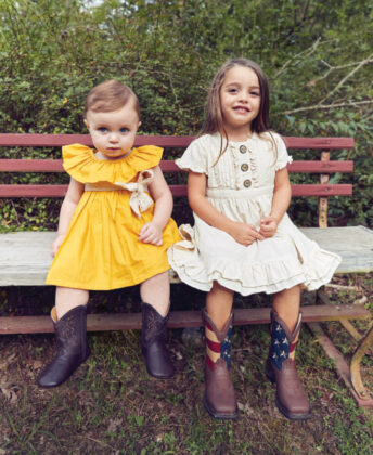 Siena wears yellow dress 
by Kariu, soft-soled western boots by Nomandino and ML Kids crochet belt; Valentina wears Ren & Rouge dress 
 with Durango cowboy boots.