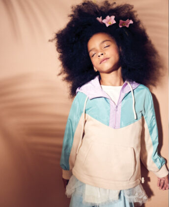 Charis wears hoodie by The New Society, white top by Tia Cibani and Hebe pants.