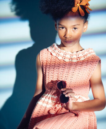 Opposite: Charis 
wears Misha and Puff knit 
dress and holds sunglasses by Toucca Kids.