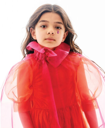 Samsara wears sheer dress 
and cape by Carbon Soldier over dress by Pink Chicken.