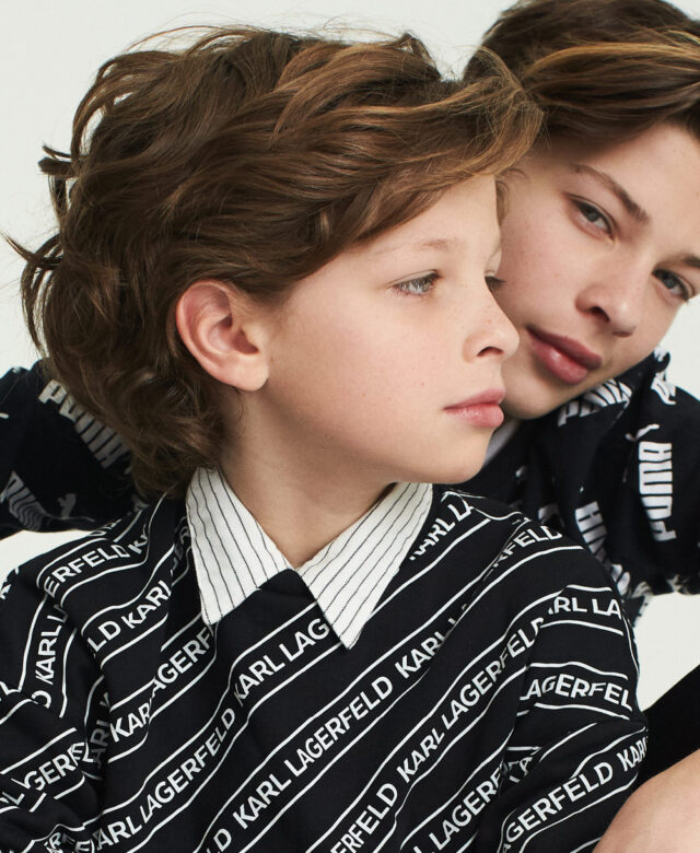Indy wears Puma hoodie; Navy wears Karl Lagerfeld sweater over Appaman button-down.